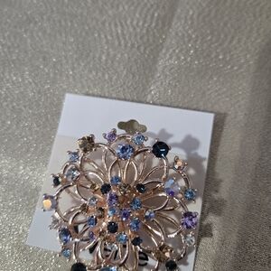 Elegant Floral Brooch with Blue and Purple Accents